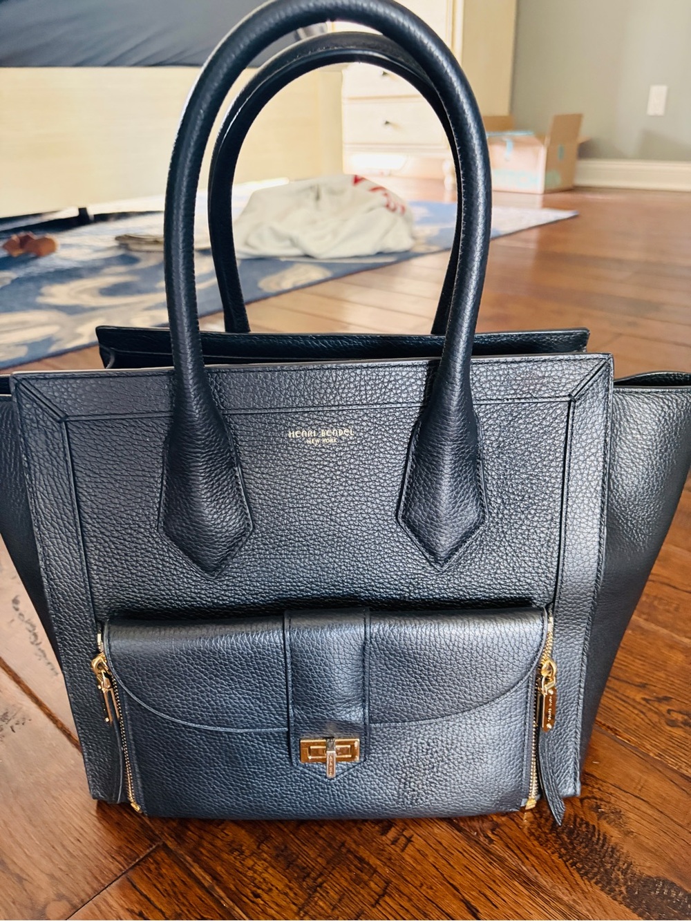 The Henri Bendel Rivington Large Convertible Tote in black excellent condition